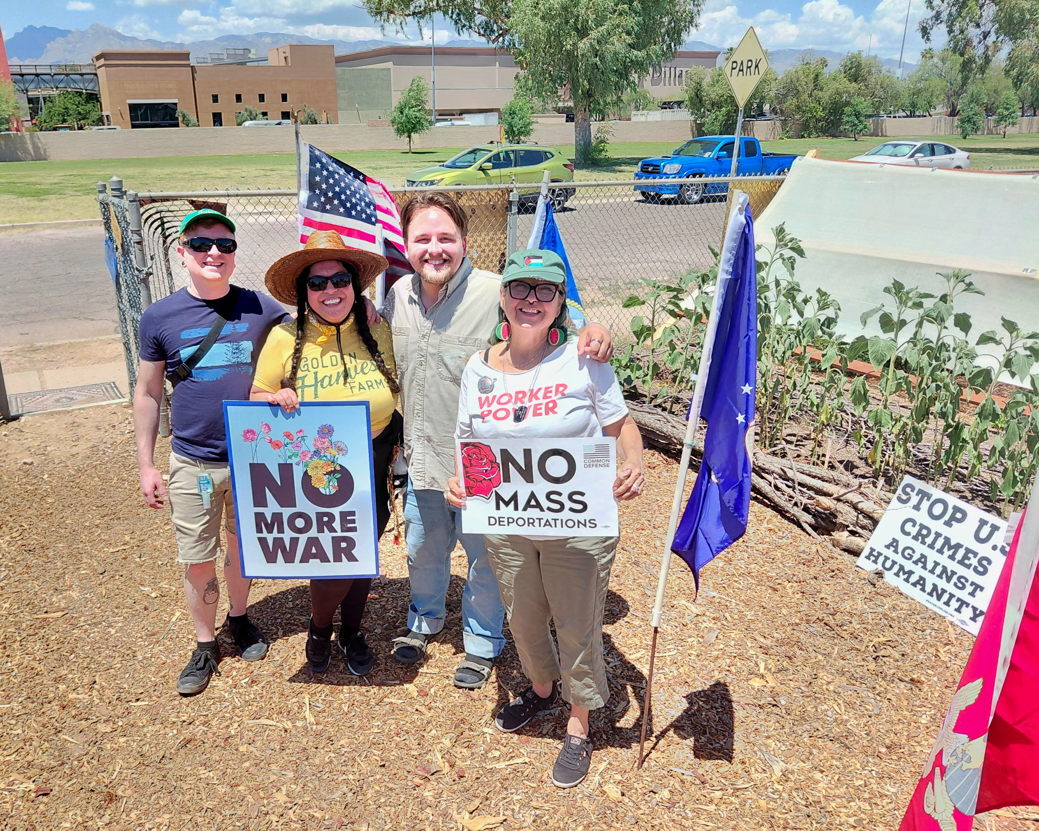 Food Army garden crew with No More War sign